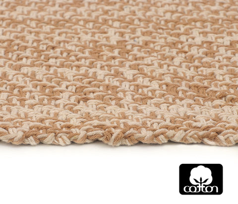 COTTON CRAFT rug on wood floor in living room conveys cozy farmhouse vibe.