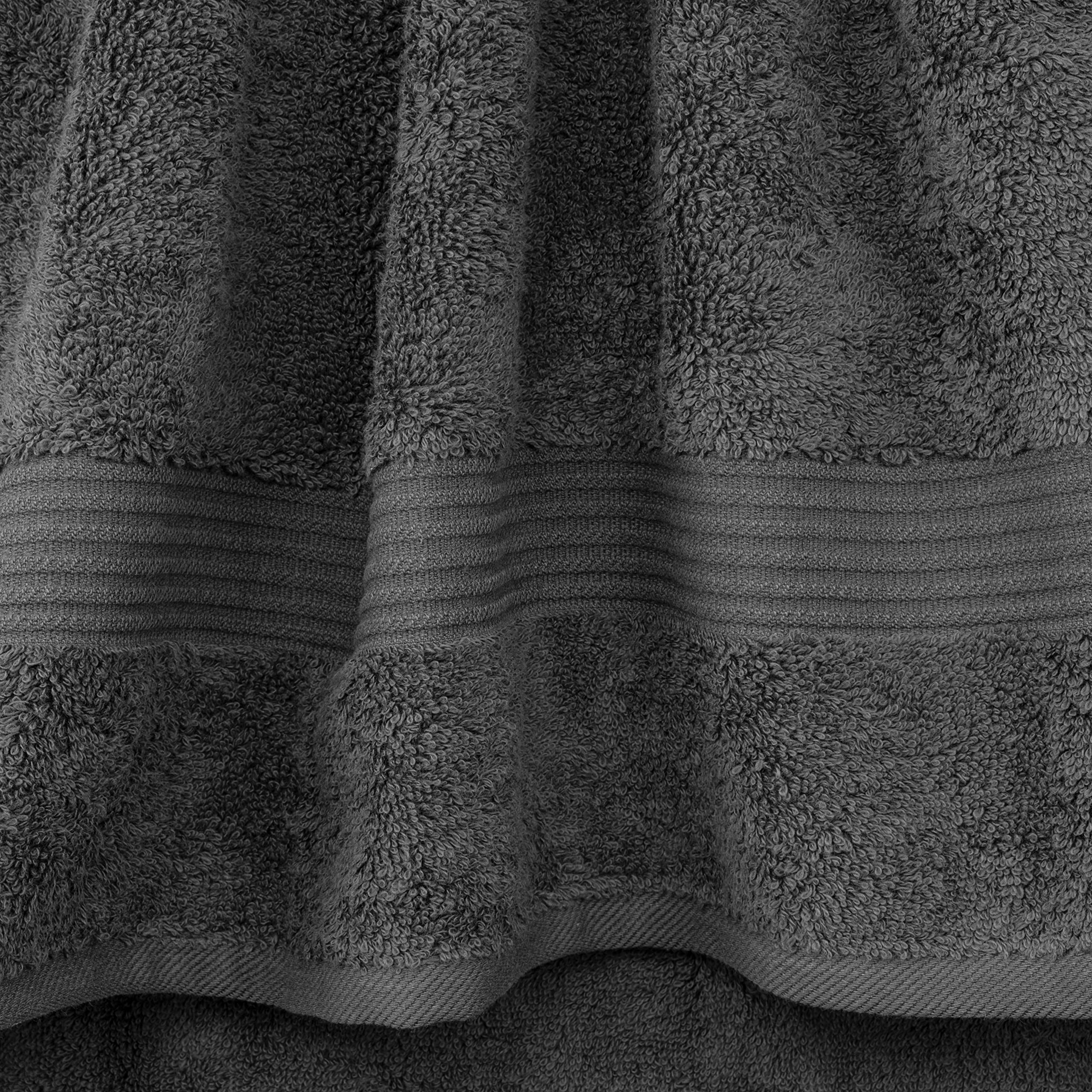 Large 27 by 54 inch towels laid out for generous bath coverage.