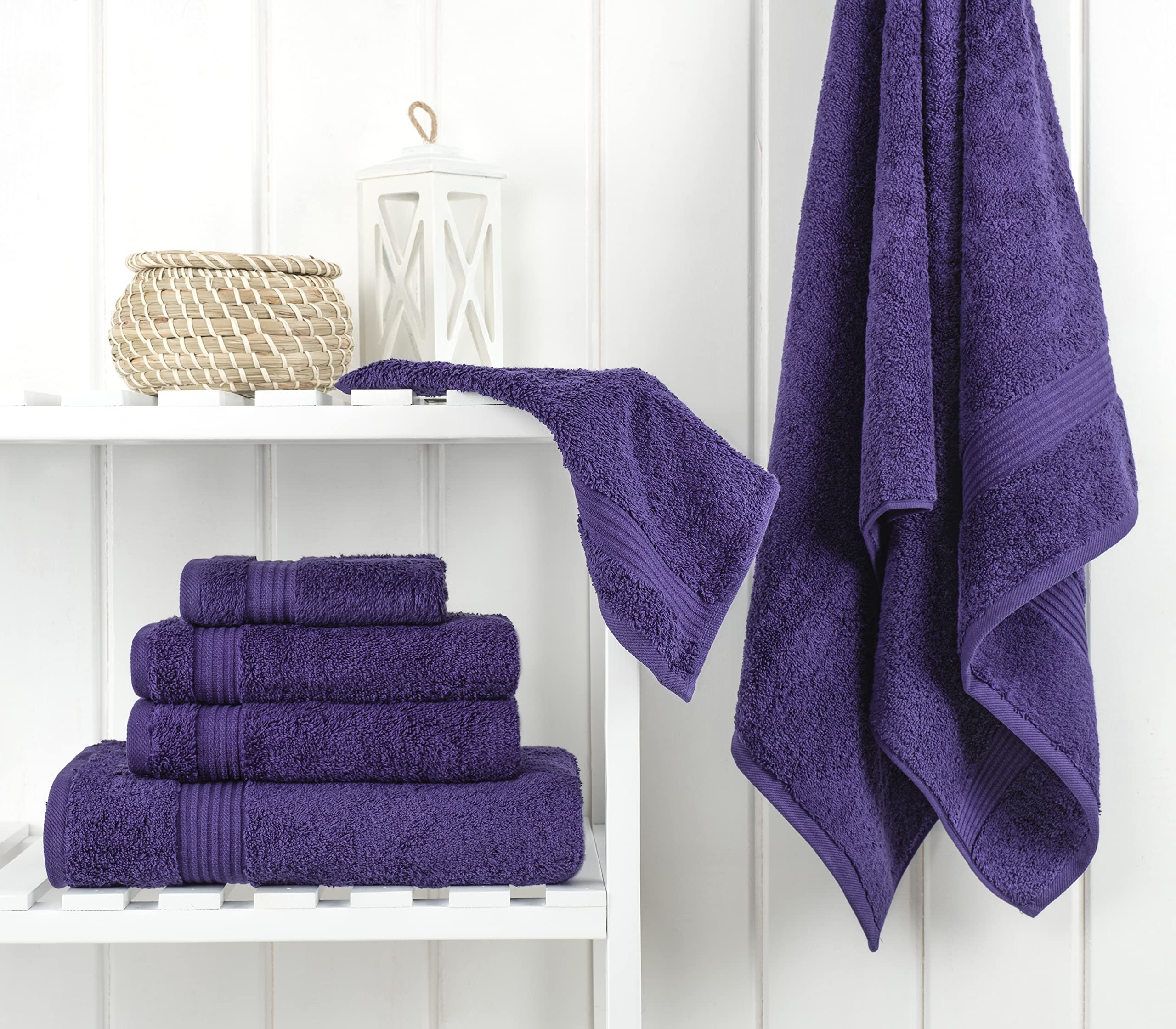 Cotton Paradise bath towels 27x54 purple offering quick-drying comfort after showers.