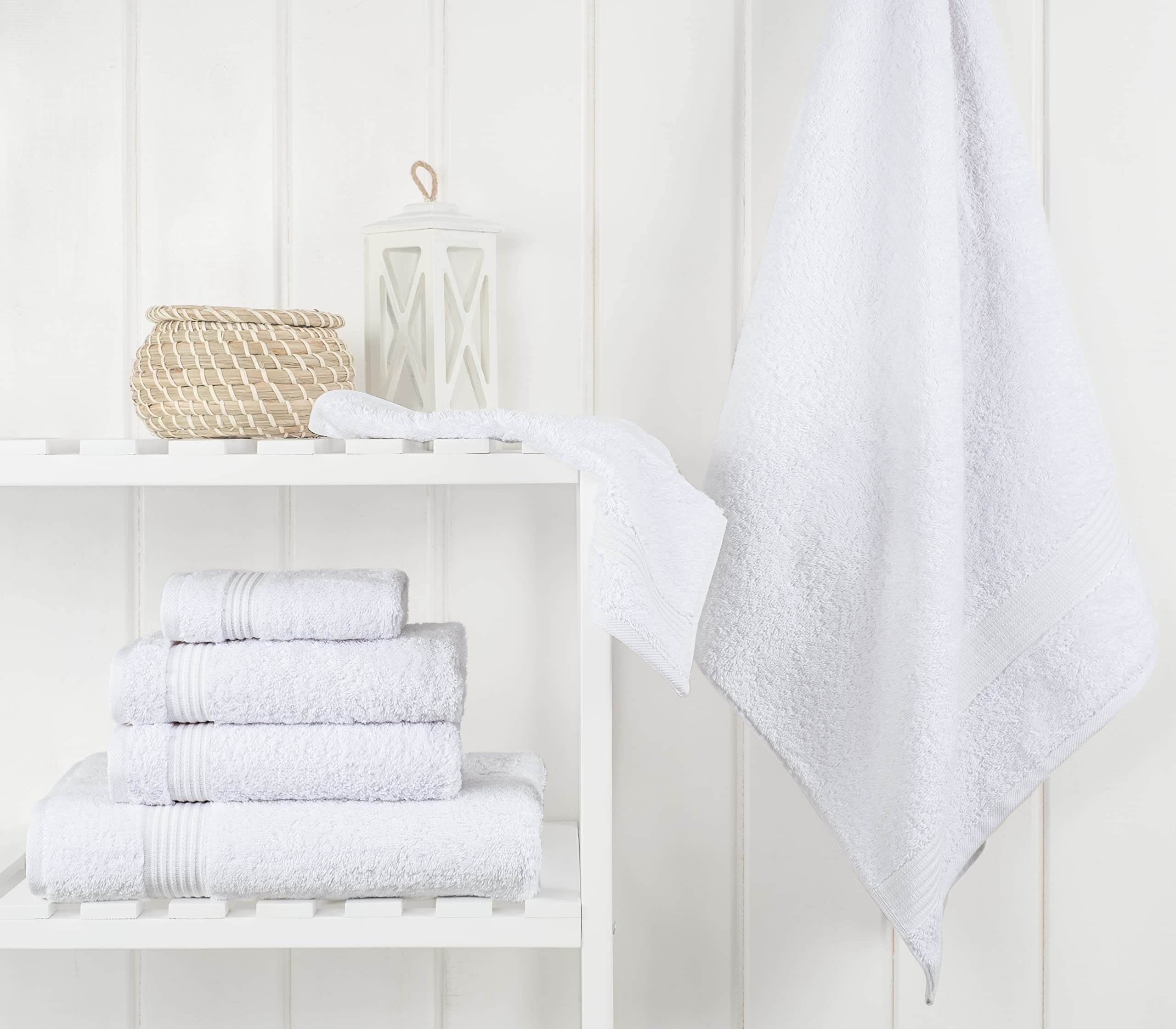 Cotton Paradise bath towels 27x54 inches ready for quick-drying after shower.