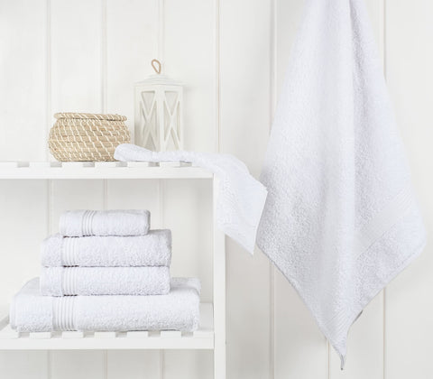 Cotton Paradise bath towels 27x54 inches ready for quick-drying after shower.