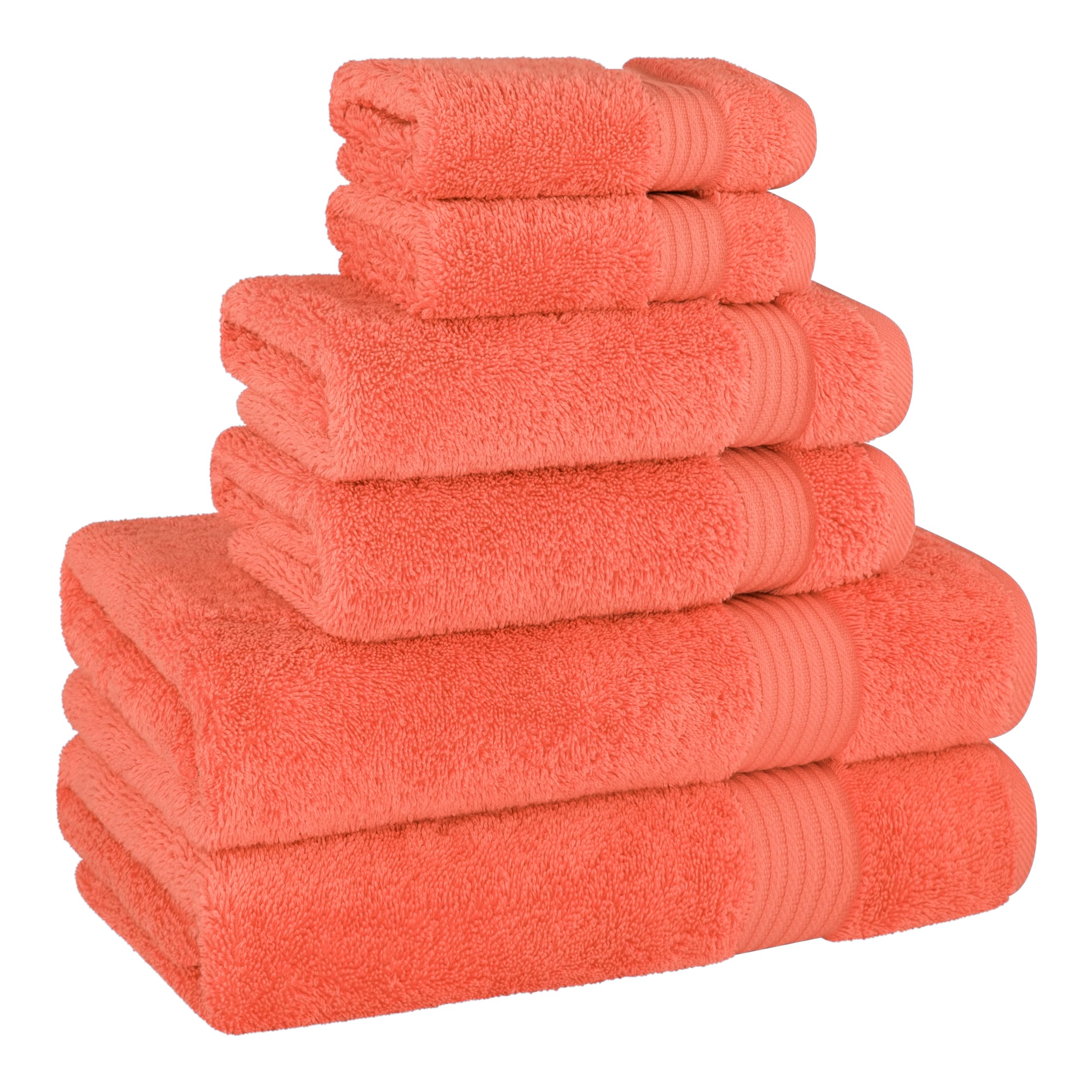 Cotton Paradise coral towel setup in bathroom demonstrates coordinated decor and quick drying after showers.