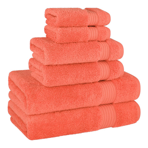 Cotton Paradise coral towel setup in bathroom demonstrates coordinated decor and quick drying after showers.