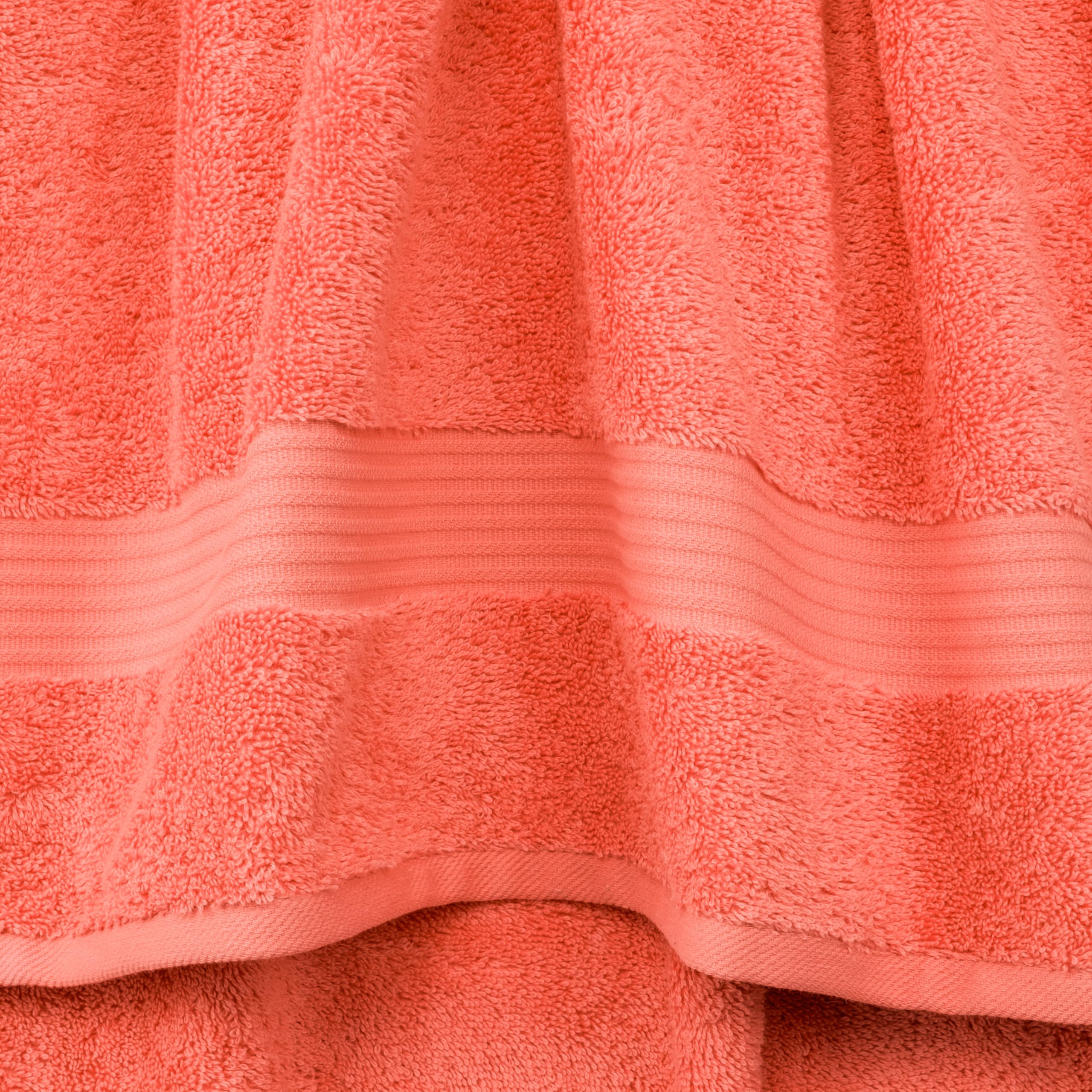 Cotton Paradise coral two washcloths shown, perfect for face cleansing and refreshing routines.