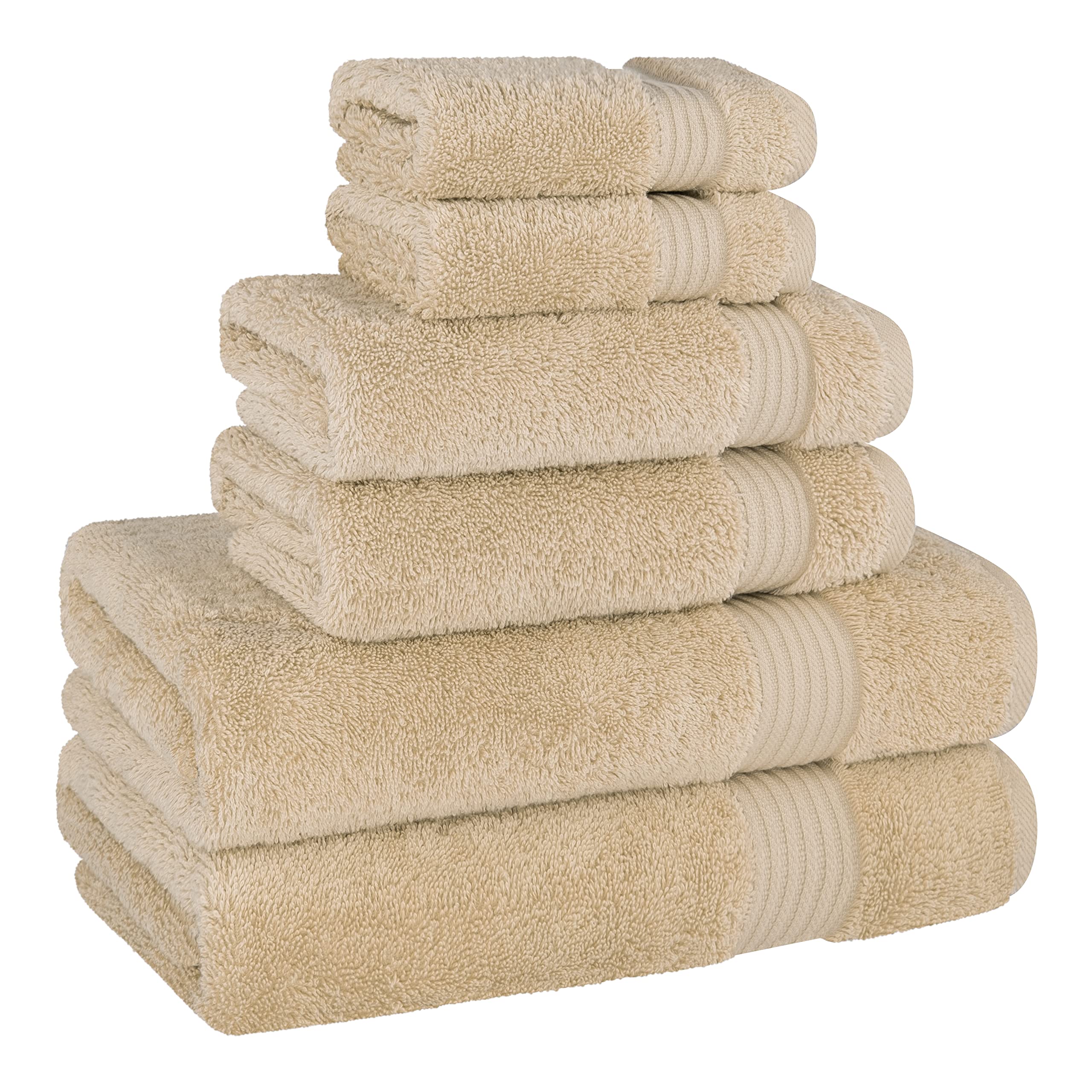 Beige towels from Cotton Paradise with double-stitched hems for durability.