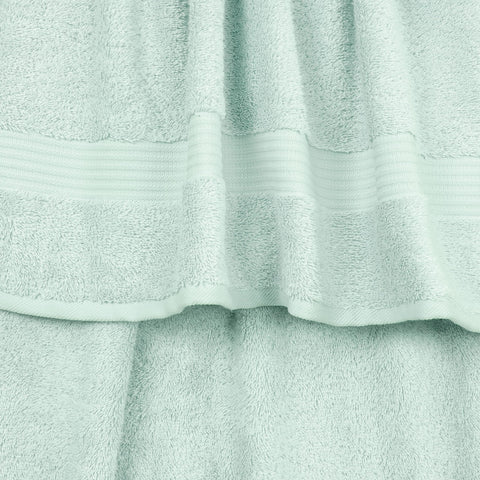 Two mint hand towels ready for daily use and guests