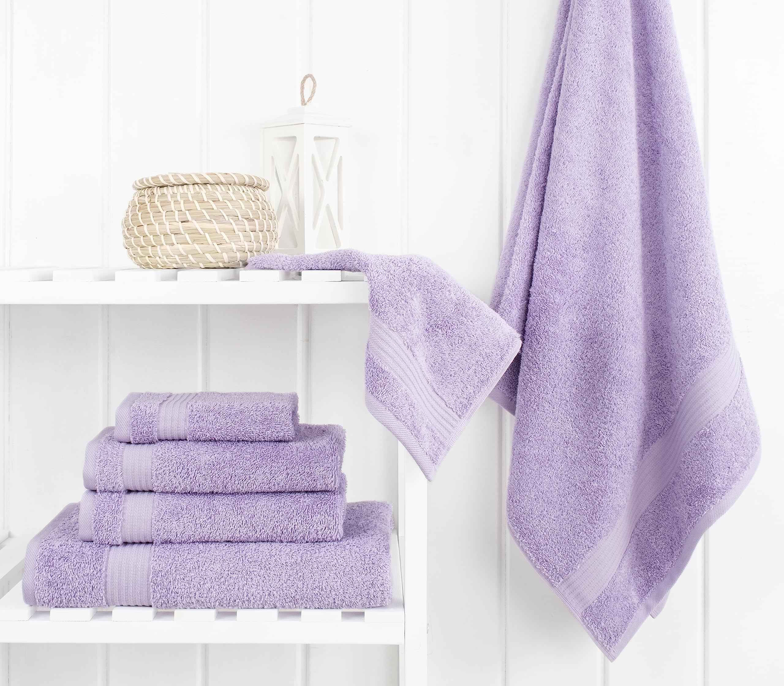 Cotton Paradise lilac towel set hand towels folded, ideal for guest hand drying.