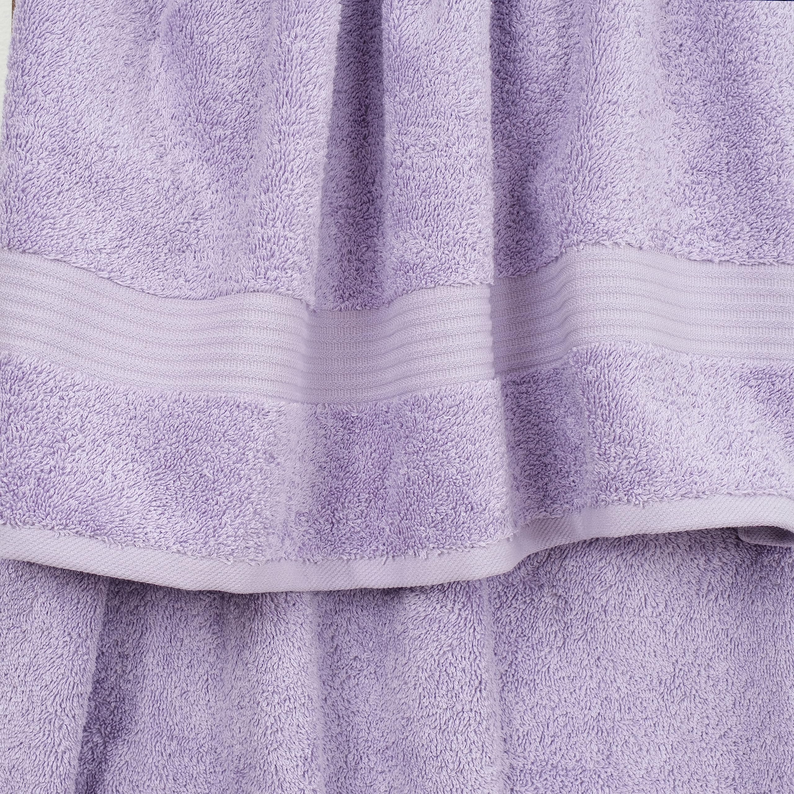 Cotton Paradise lilac towel set washcloths stacked, quick-dry microtexture for refreshing routines.