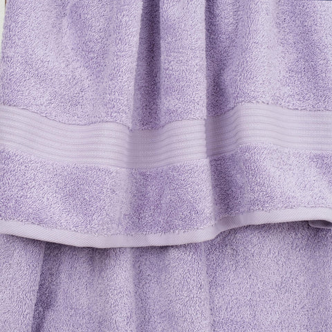 Cotton Paradise lilac towel set washcloths stacked, quick-dry microtexture for refreshing routines.