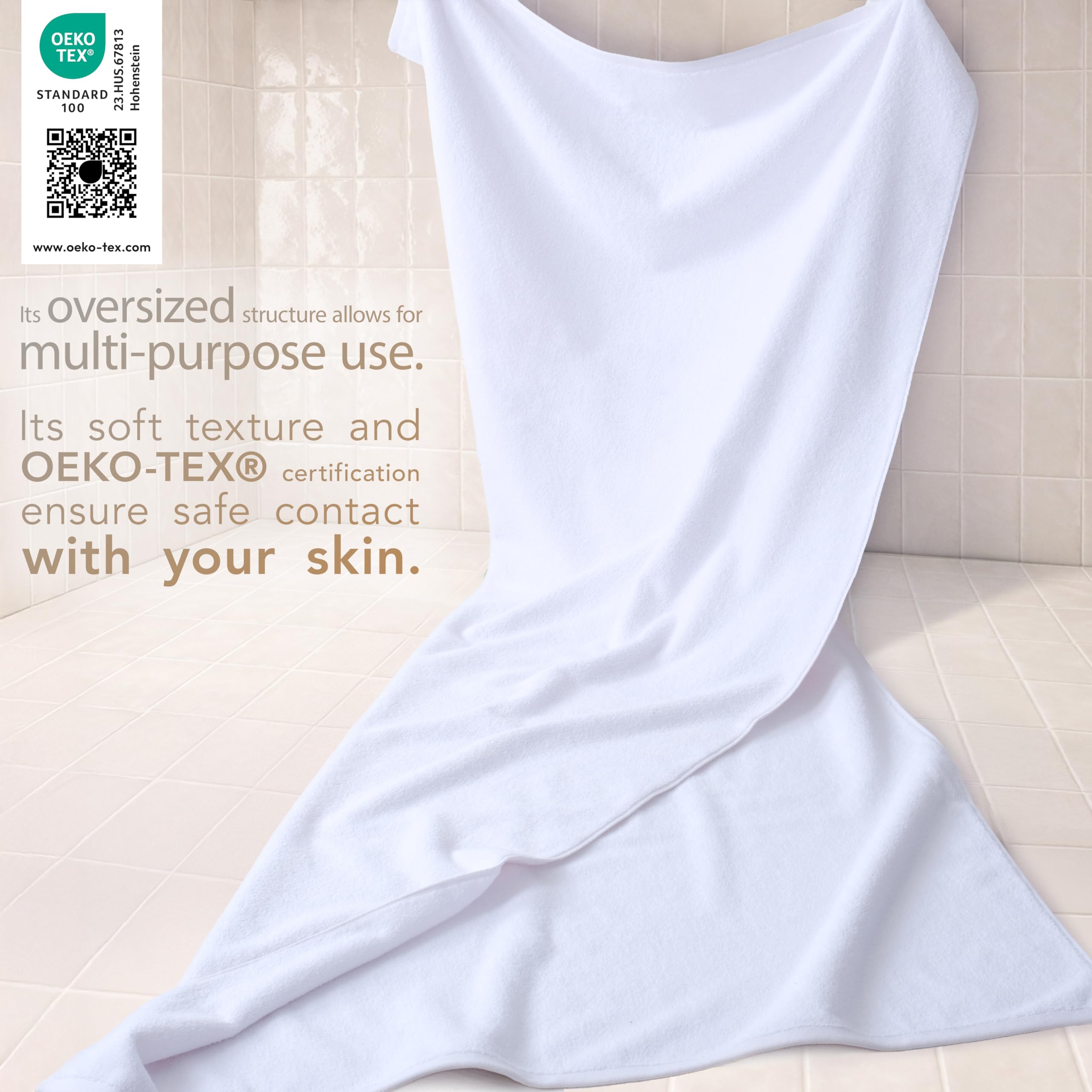 Cotton Paradise oversized bath sheet on rack, ideal for families after showers.