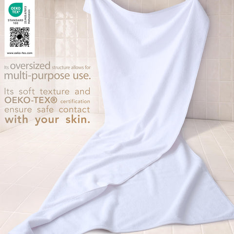 Cotton Paradise oversized bath sheet on rack, ideal for families after showers.