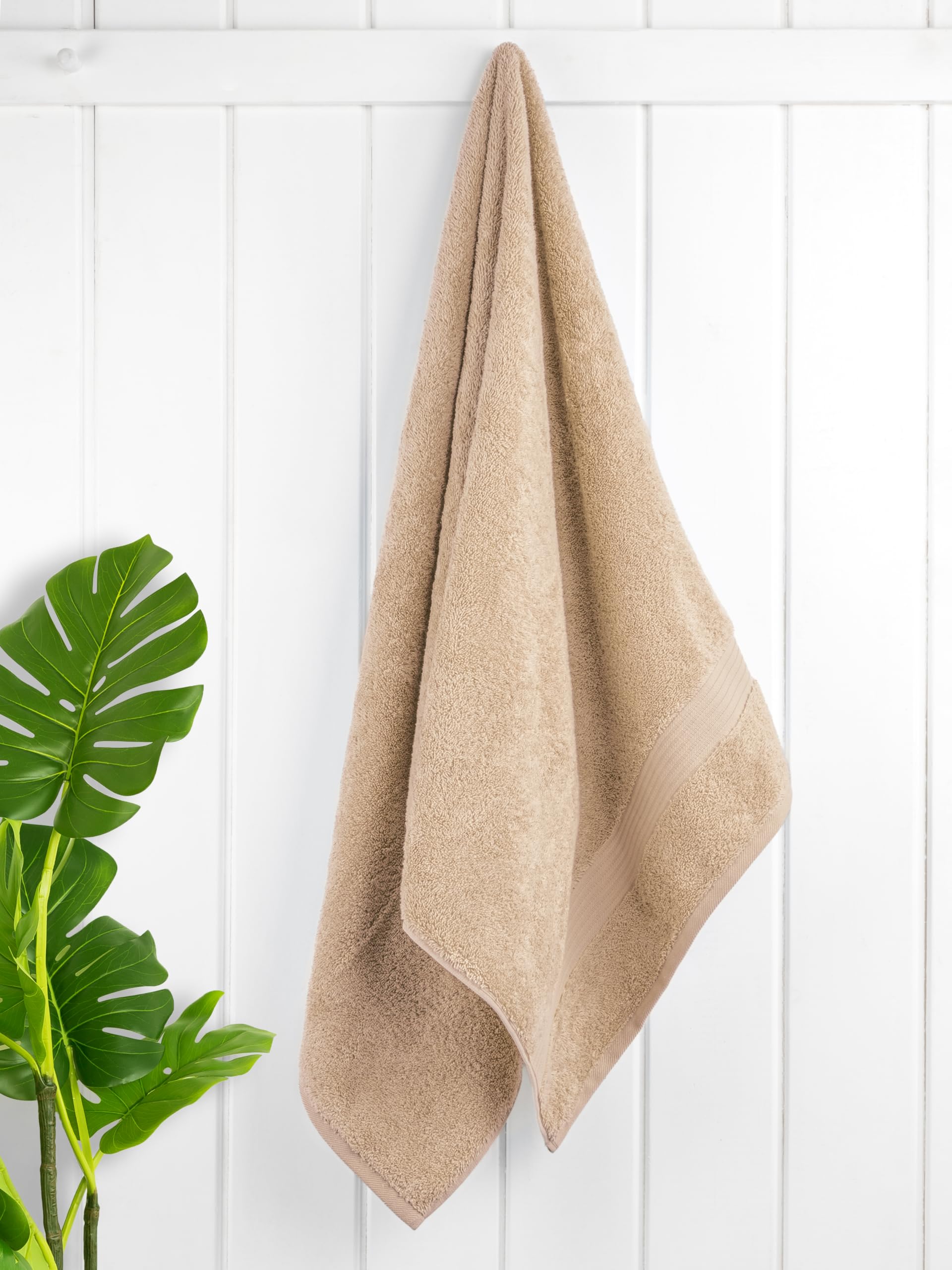 Close-up of soft, fluffy Cotton Paradise towels highlighting plush texture and high absorbency.