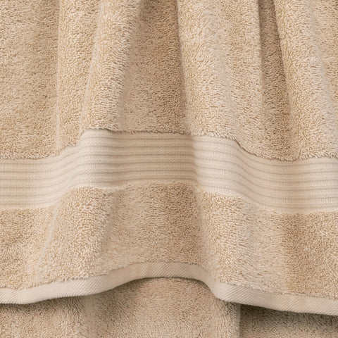 Towels draped on a rack demonstrate quick-dry, hotel-spa quality comfort.