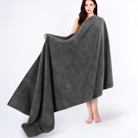 Cotton Paradise dark gray Turkish towel laid flat for luxurious bath comfort
