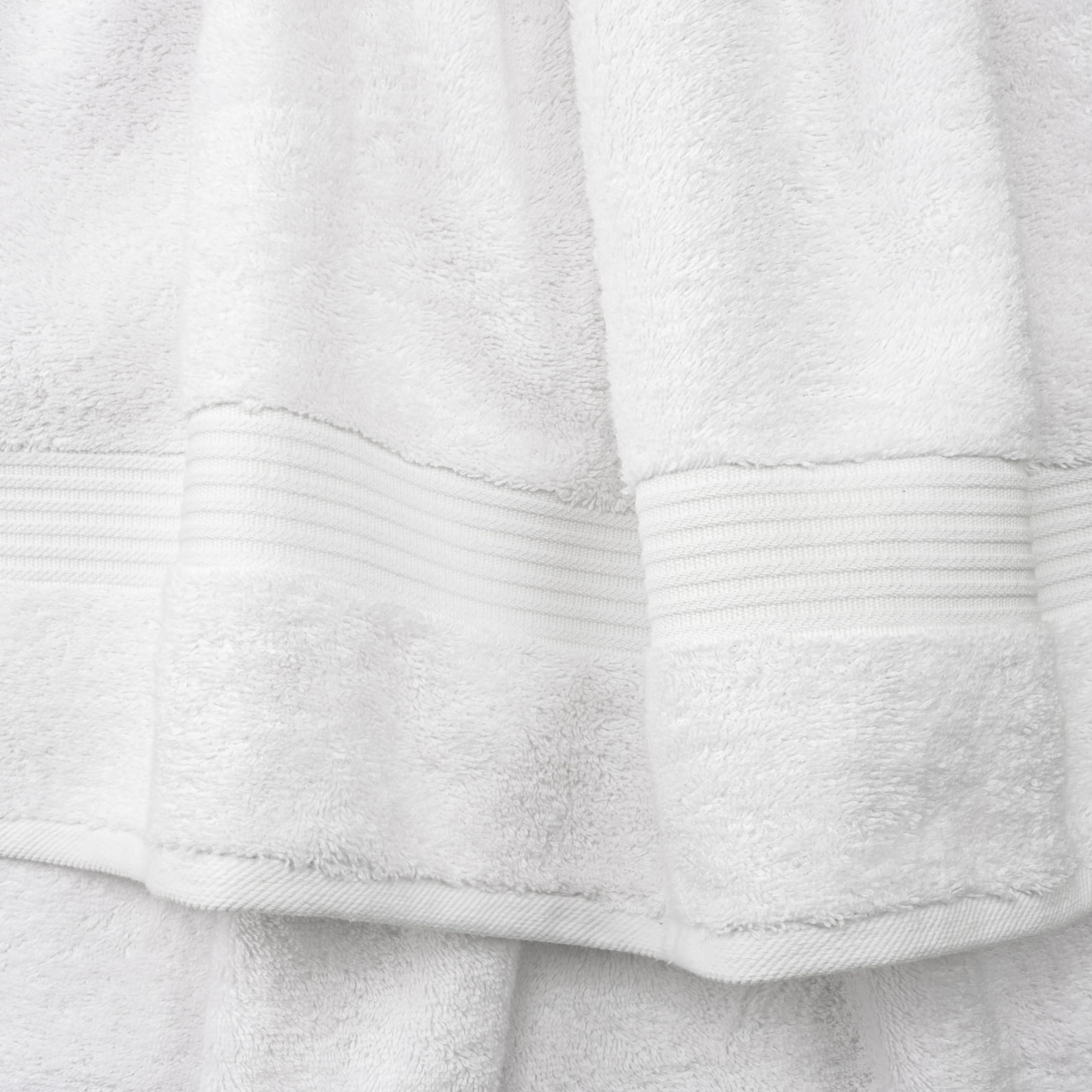 Cotton Paradise towels hanging on rack highlight quick-dry design