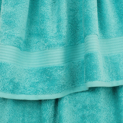 Cotton Paradise washcloths turquoise deliver soft texture and quick-dry performance for showers.