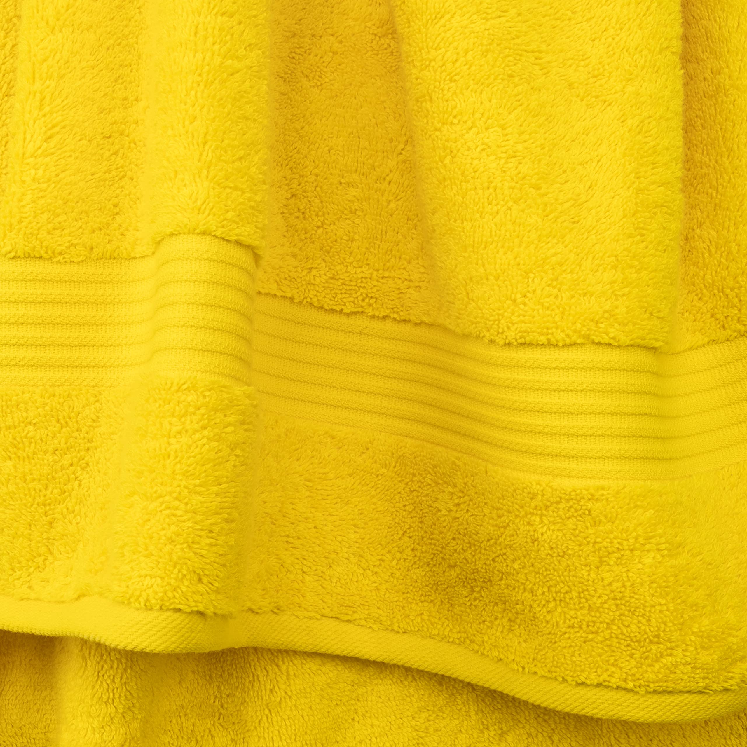 Cotton Paradise yellow washcloths 13x13 lightweight yet highly absorbent.