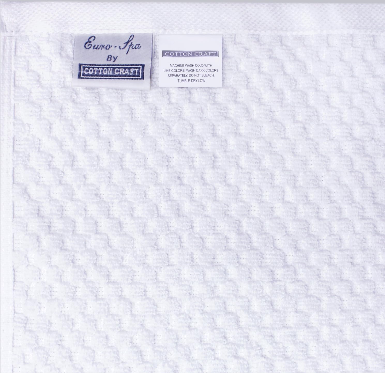 Cotton Craft towels shown with a machine-wash friendly care routine.