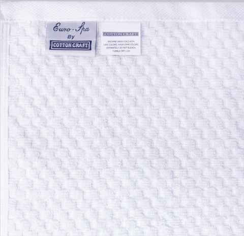 Cotton Craft towels shown with a machine-wash friendly care routine.