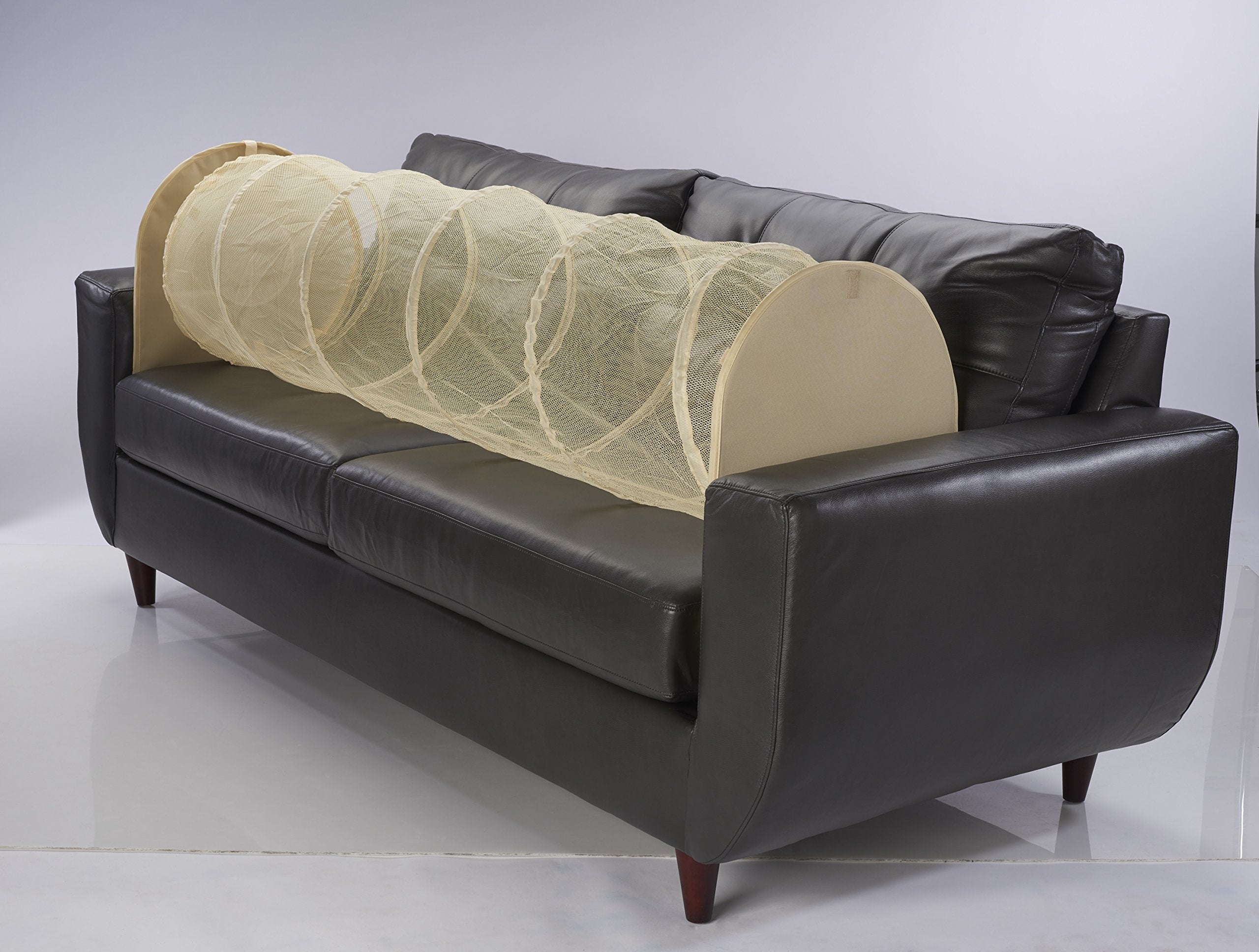 Couch Defender Beige in use on sofa to deter pets and protect upholstery.