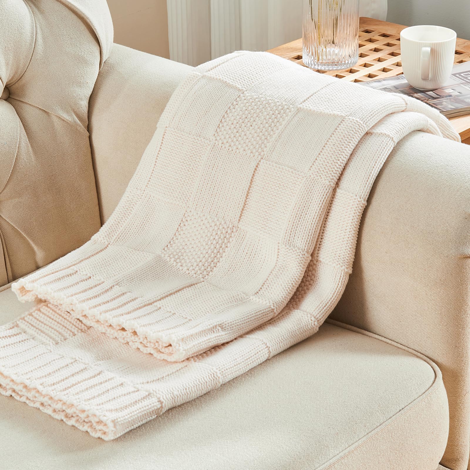CozeCube bed and sofa throw in cream complements beds and couches.