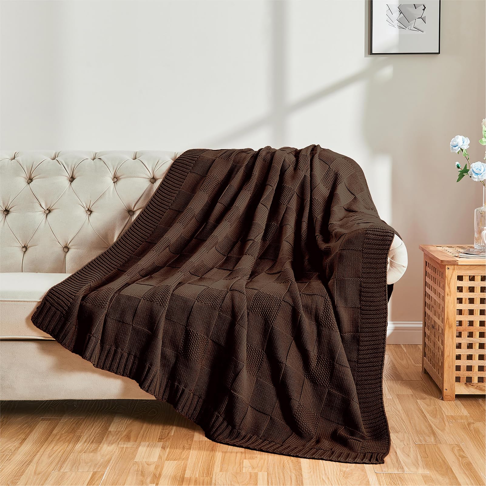 CozeCube blanket draped over bed adding warmth to the bedroom