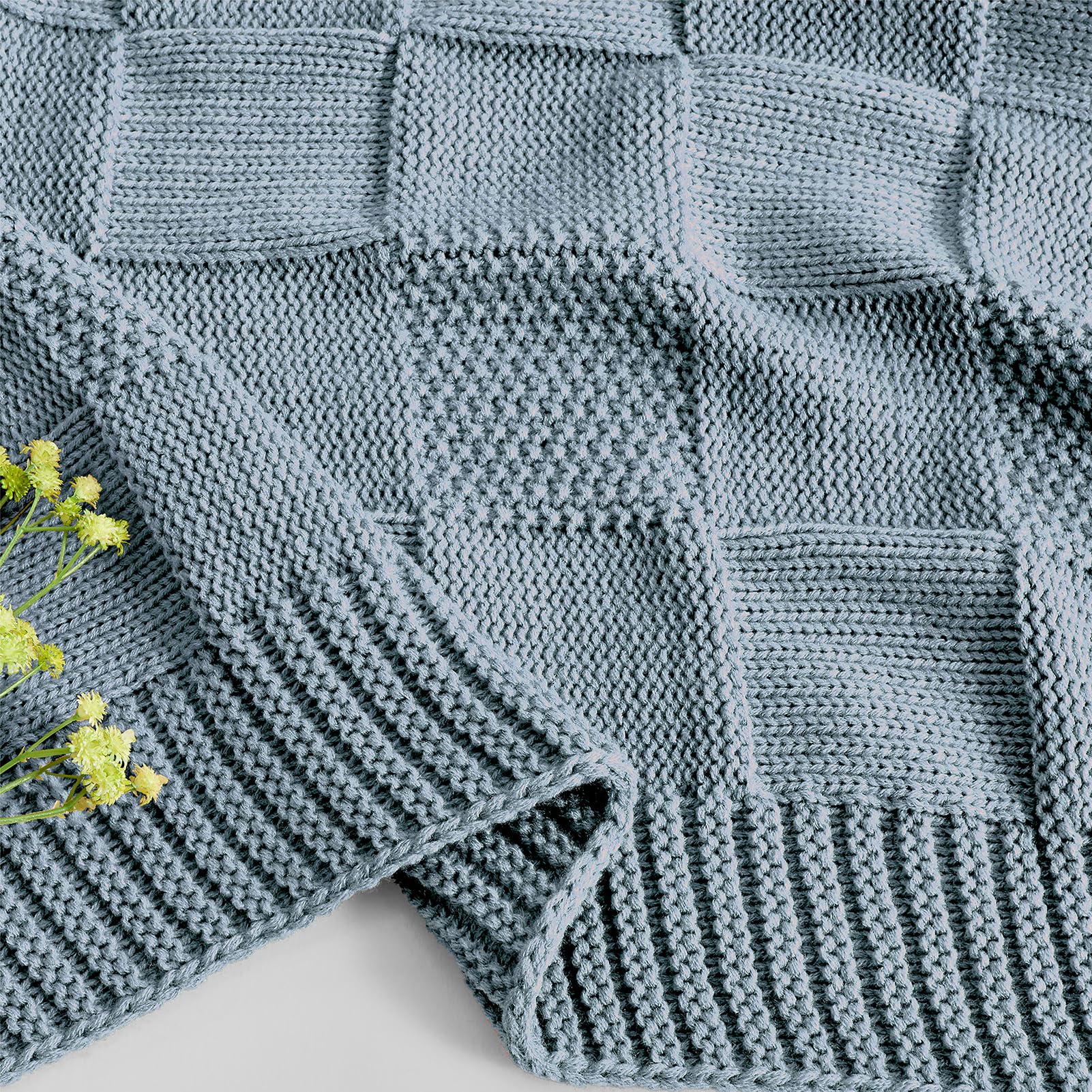 CozeCube dusty-blue knit blanket brings versatile warmth to bed, sofa, or chair.