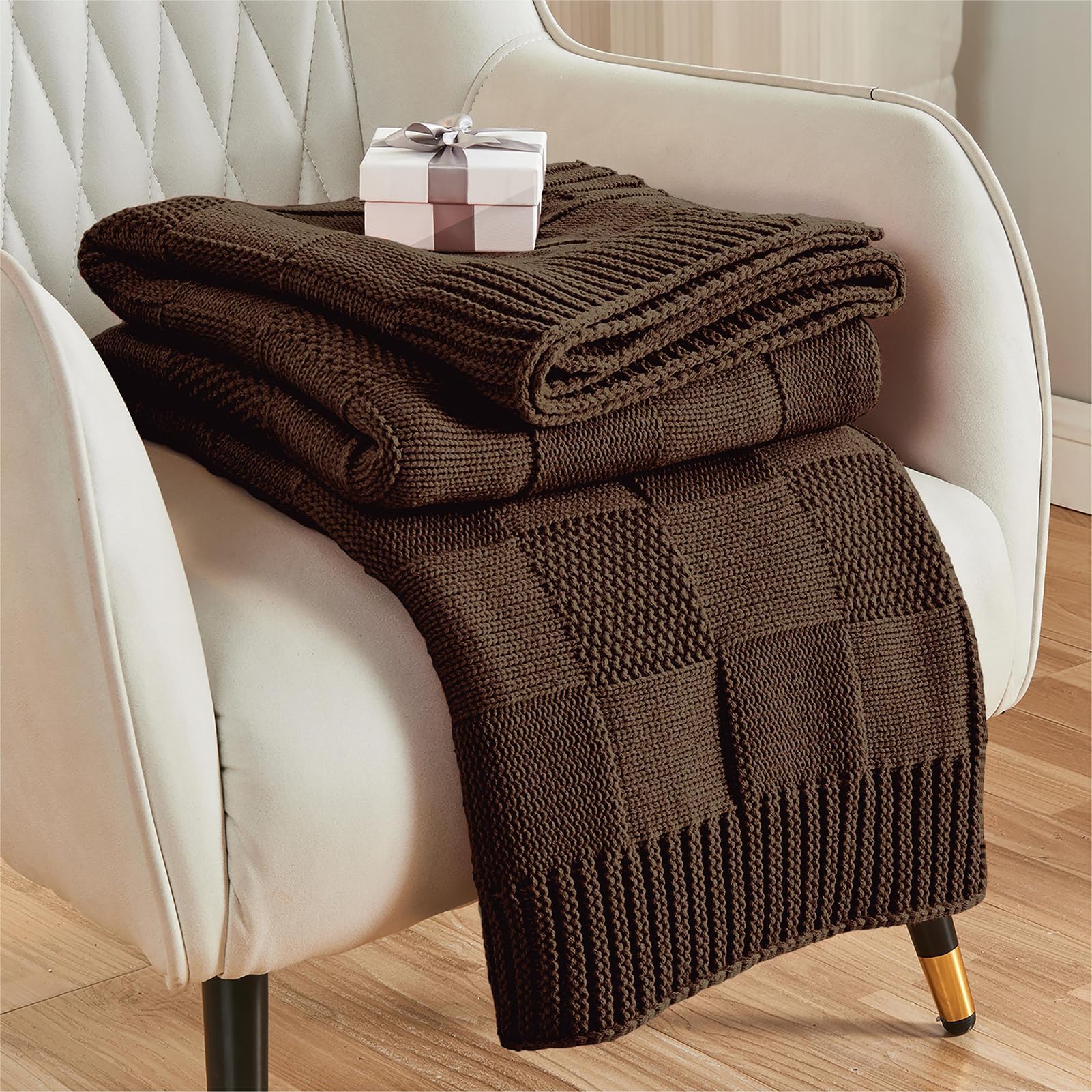 CozeCube check knit throw on sofa offering cozy warmth for the living room