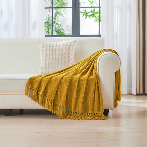 CozeCube chenille blanket neatly placed on bed for inviting ambiance
