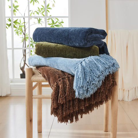 Tassel detail on CozeCube throw enhances casual couch decor