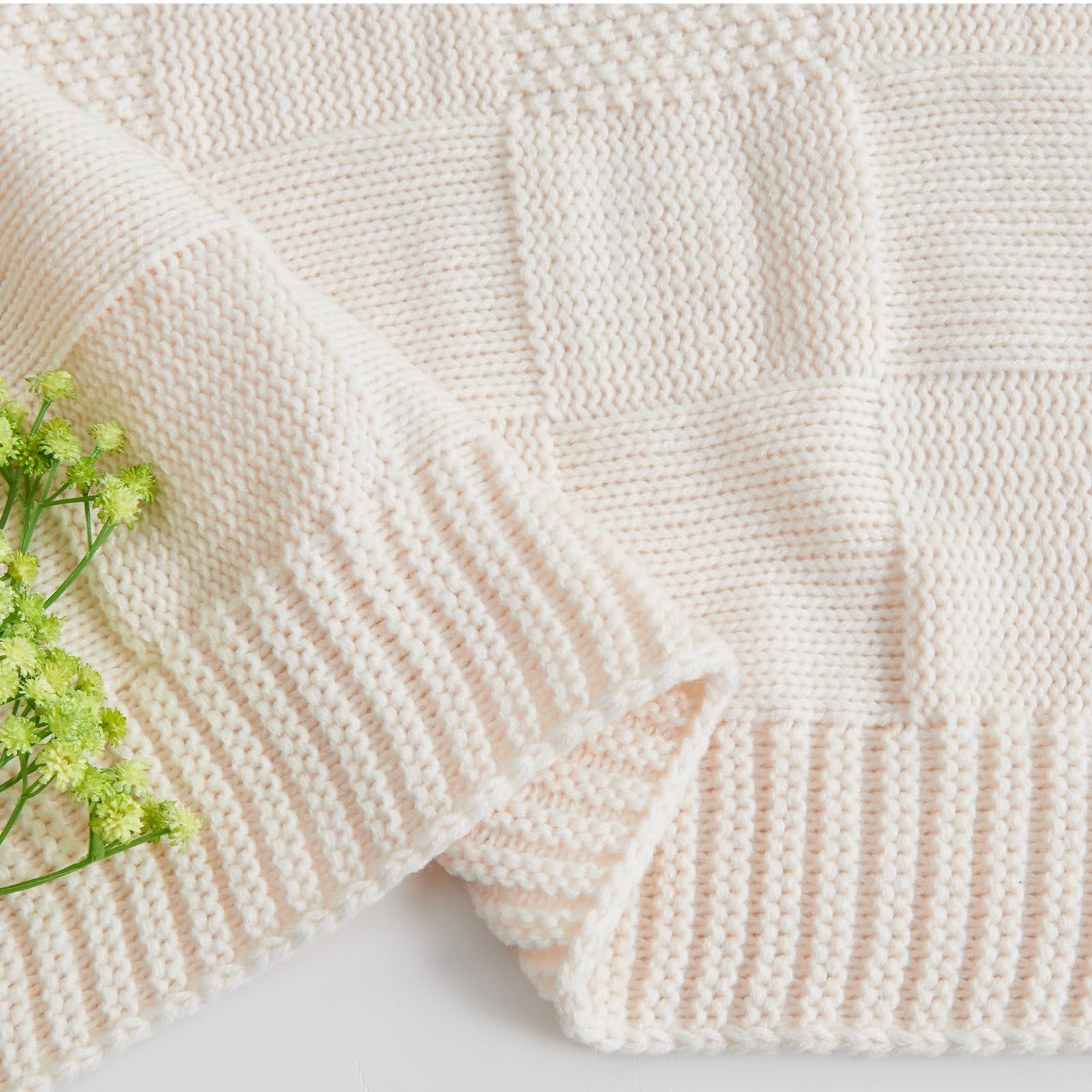 CozeCube cozy knit blanket provides warmth for evenings of TV or reading.