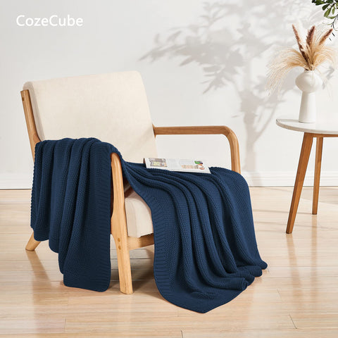 CozeCube Navy Blue Throw draped on couch adds stylish living room appeal