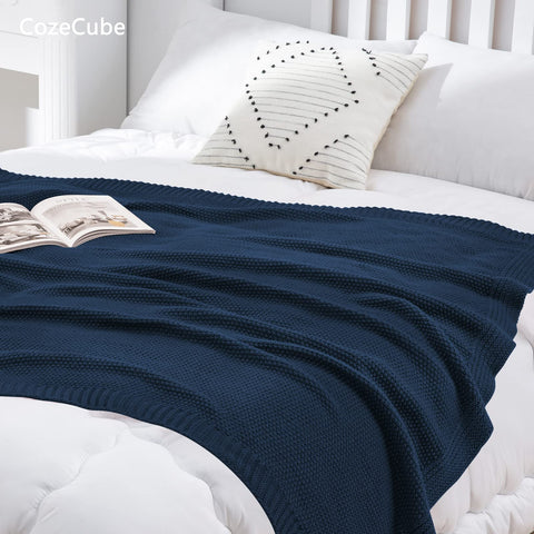 CozeCube Navy Blue Throw outdoors for cool evenings on a patio