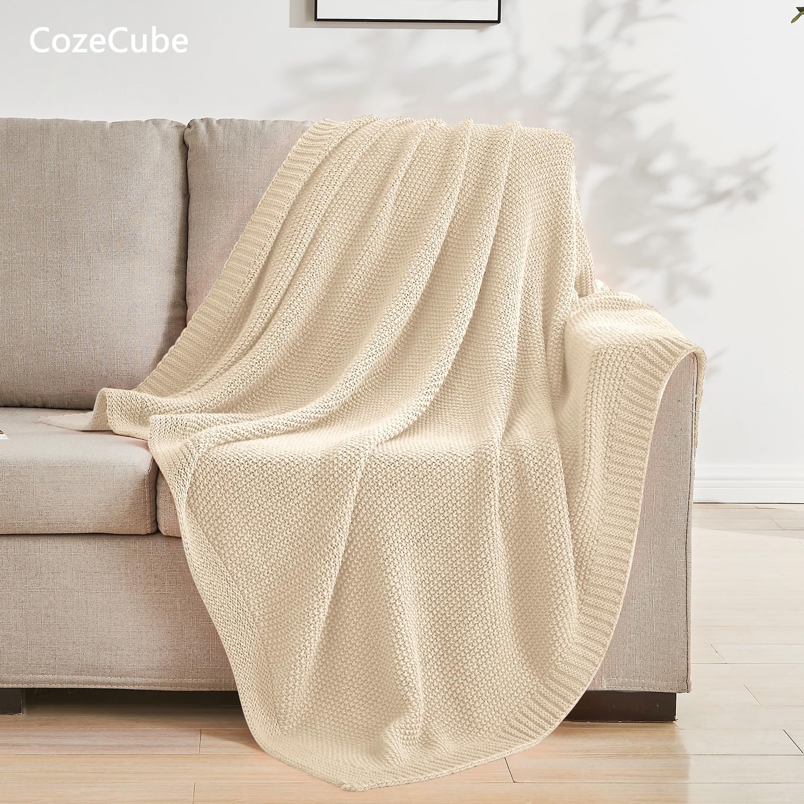 CozeCube seed-stitch knit closeup highlighting dense texture and softness.