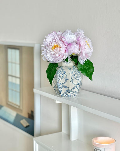 COZLIV Vintage Blue Ceramic Vase on mantel enhances classic decor.