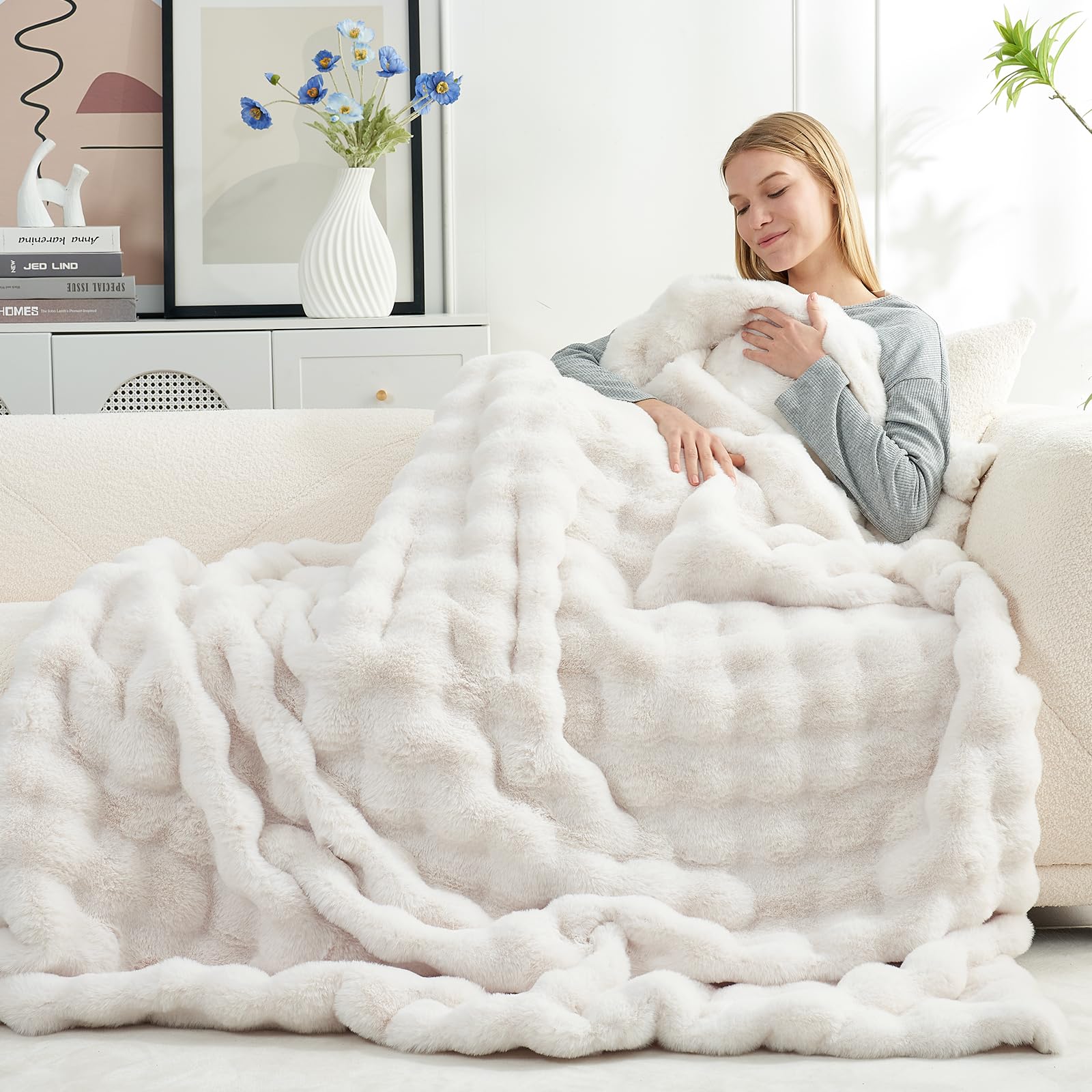 Cozy Bliss 50x60 inch size fits sofas and beds.