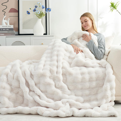 Cozy Bliss 50x60 inch size fits sofas and beds.