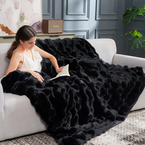 Cozy Bliss 630 GSM faux rabbit fur face provides plush warmth.