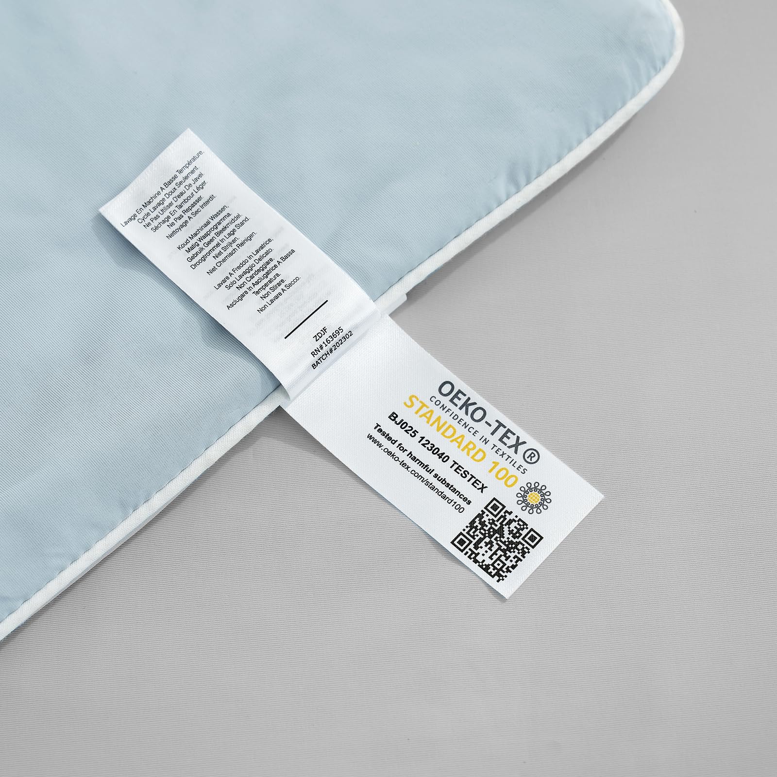 Cozy Bliss cooling comforter queen draped on chair, versatile use anywhere.