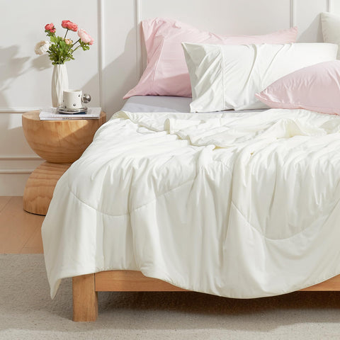 Cozy Bliss cooling comforter comes in a soft cream shade