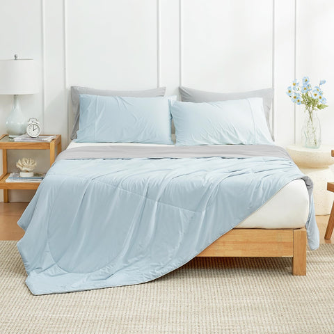 Cozy Bliss cooling comforter queen spread on bed, airy and cooling for warm nights.