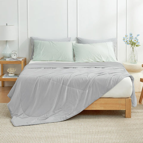 Texture close-up emphasizes silky-smooth fabric of the Cozy Bliss comforter.