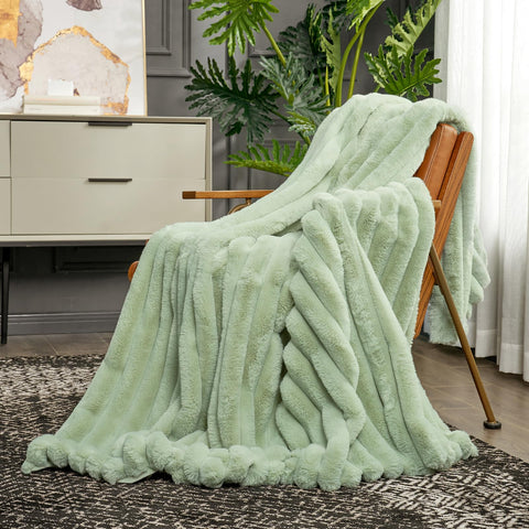 Cozy Bliss faux fur throw blanket closeup reveals dense fur texture and softness.