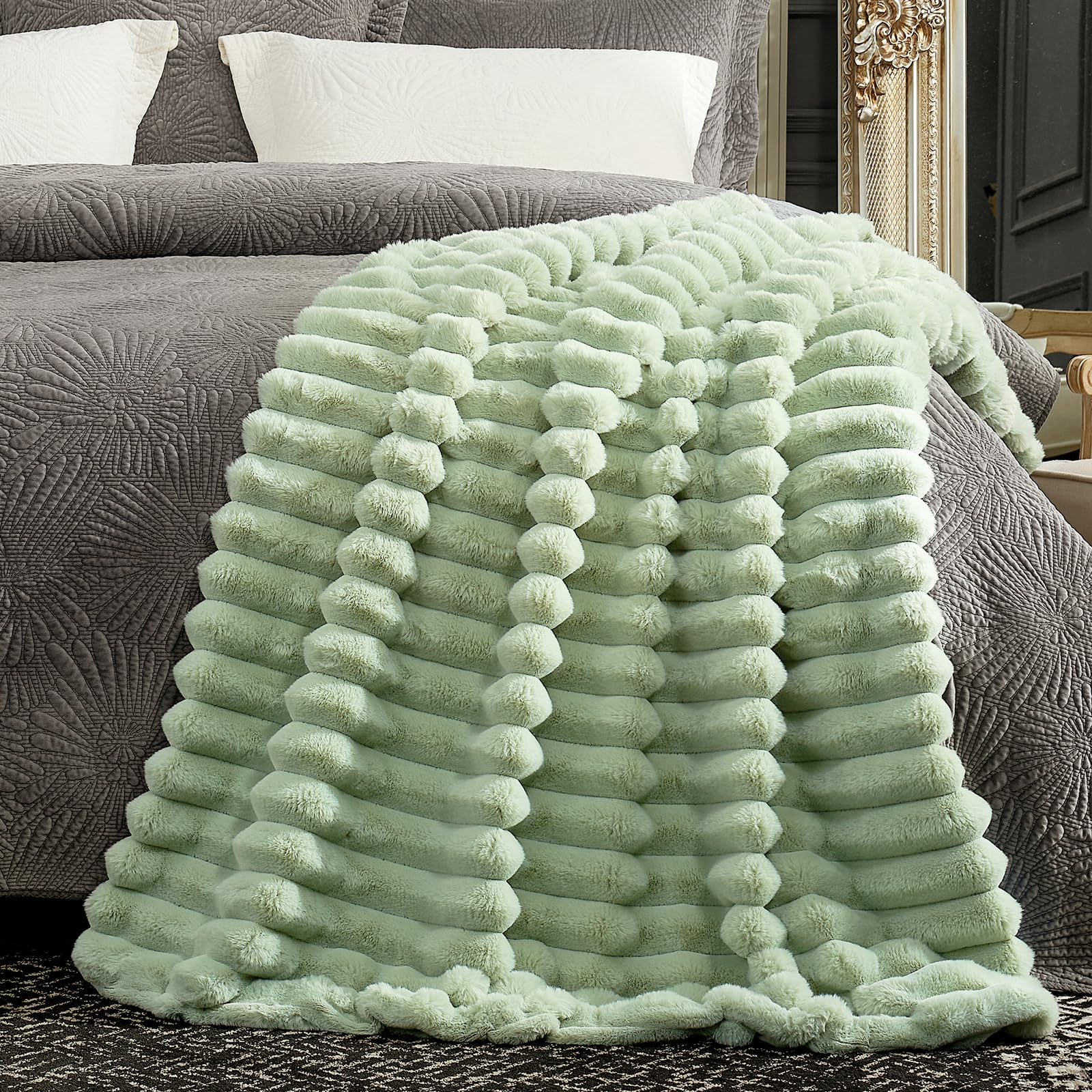 Cozy Bliss faux fur throw blanket folded on display creates a plush accent.