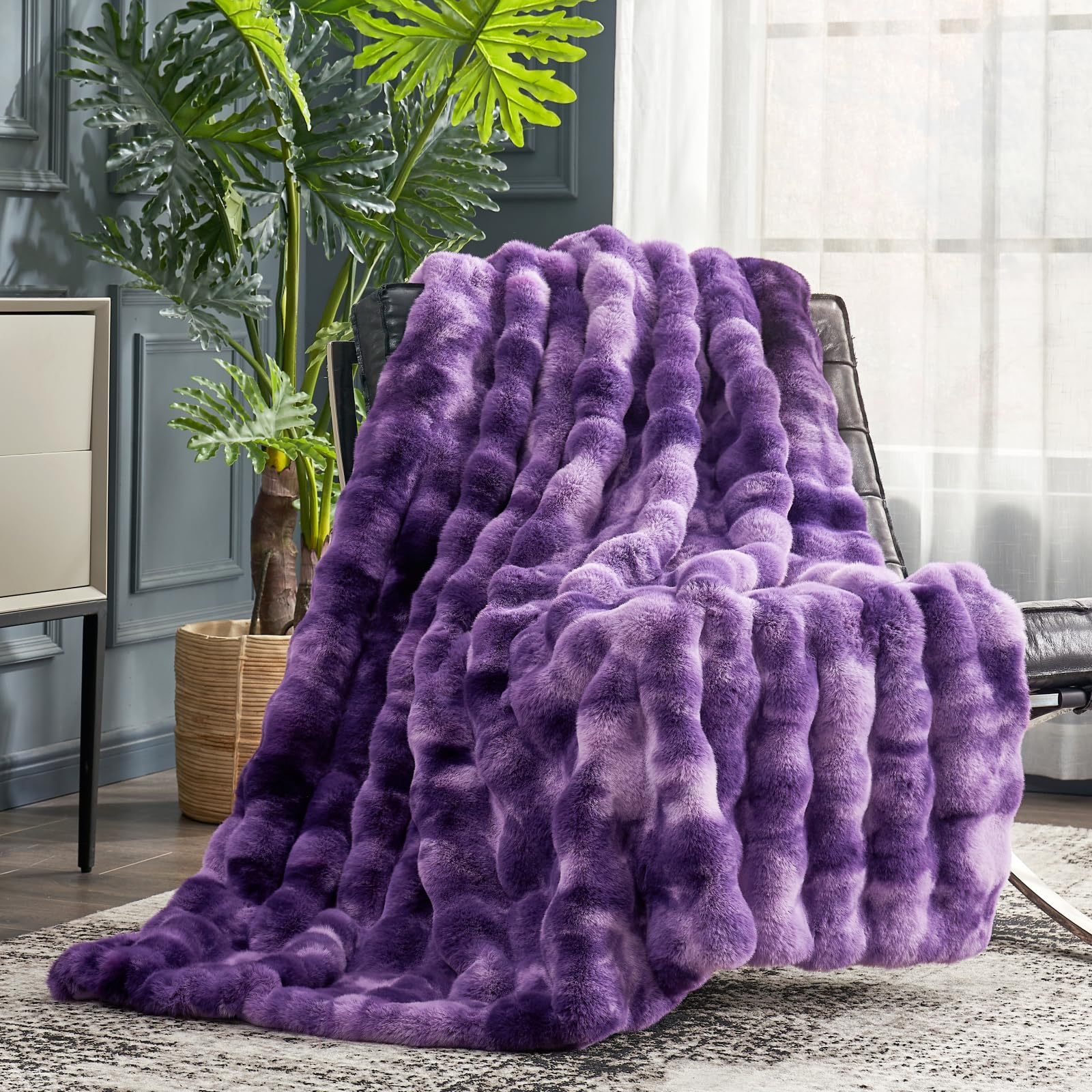 Cozy Bliss faux fur throw with bubble design in purple for sofa warmth.