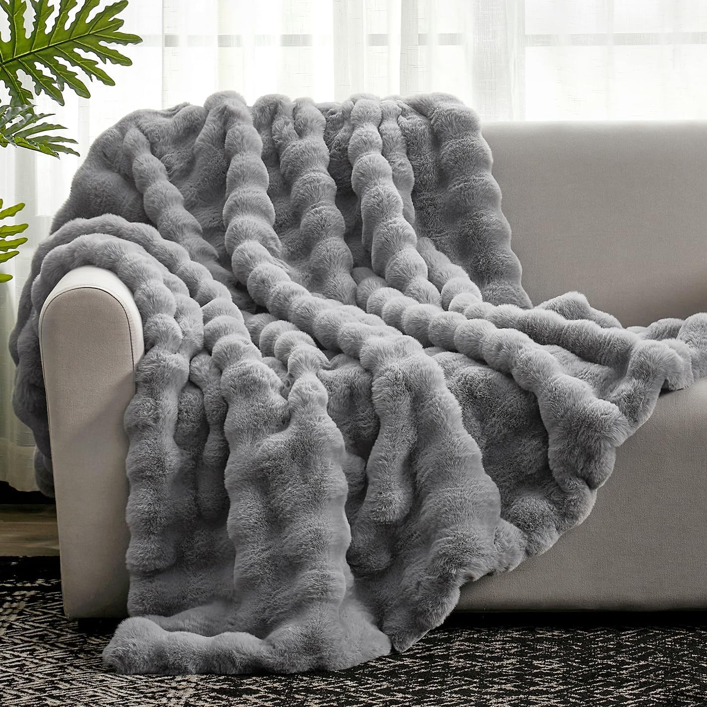 Cozy Bliss faux fur throw bubble-front highlights plush warmth for the couch