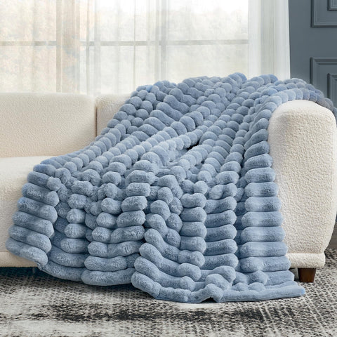 Cozy Bliss faux fur throw care label illustration suggests easy machine wash