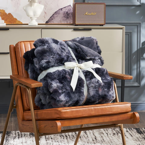 Cozy Bliss faux fur throw interior micromink fabric delivers silky softness.