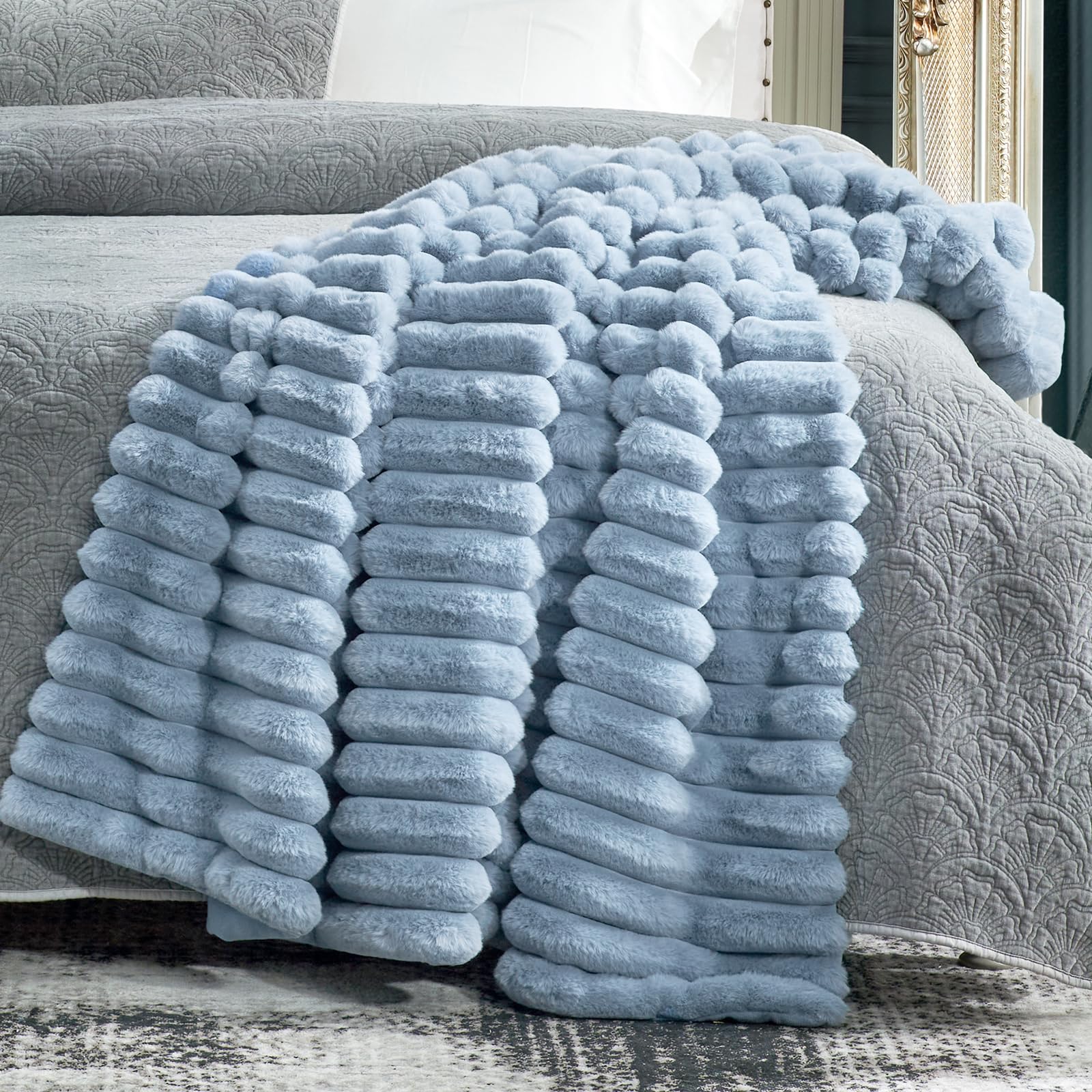 Cozy Bliss faux fur throw in living room decor offers year-round comfort
