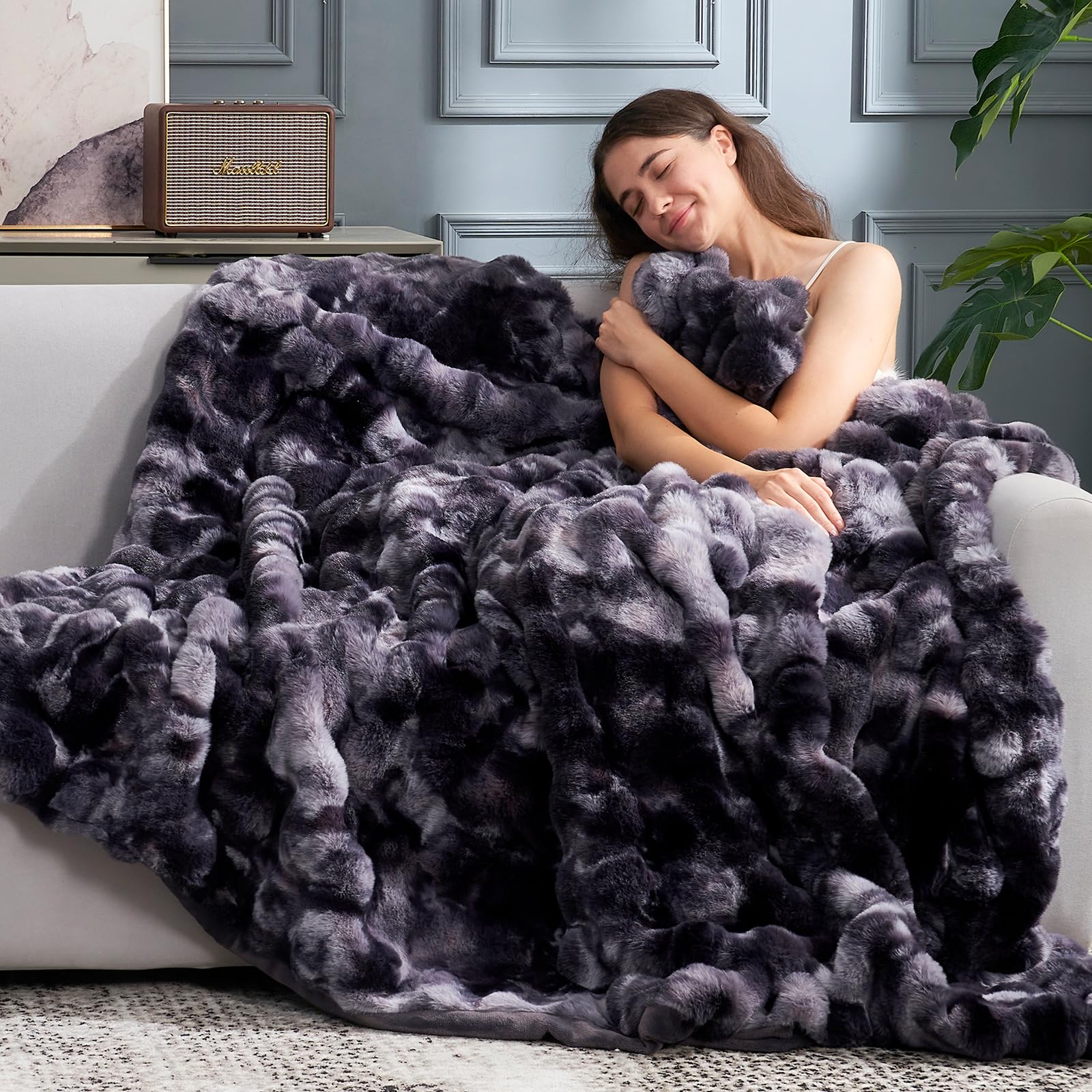 Cozy Bliss faux fur throw shows easy machine-wash care for long-lasting softness.